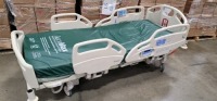 HILL-ROM CAREASSIST HOSPITAL BED W/SCALE,HEAD & FOOTBOARDS located at 902 nicholson road suite 200 Garland, TX 75042