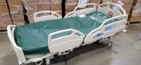 HILL-ROM CAREASSIST HOSPITAL BED W/SCALE,HEAD & FOOTBOARDS located at 902 nicholson road suite 200 Garland, TX 75042