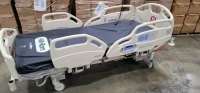 HILL-ROM CAREASSIST HOSPITAL BED W/SCALE,HEAD & FOOTBOARDS located at 902 nicholson road suite 200 Garland, TX 75042