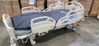 HILL-ROM CAREASSIST HOSPITAL BED W/SCALE,HEAD & FOOTBOARDS located at 902 nicholson road suite 200 Garland, TX 75042