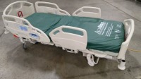 HILL-ROM CAREASSIST HOSPITAL BED W/SCALE,HEAD & FOOTBOARDS located at 902 nicholson road suite 200 Garland, TX 75042