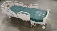 HILL-ROM CAREASSIST HOSPITAL BED W/SCALE,HEAD & FOOTBOARDS located at 902 nicholson road suite 200 Garland, TX 75042