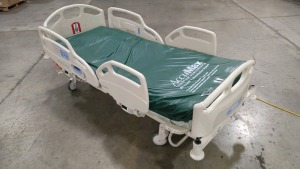 HILL-ROM CAREASSIST HOSPITAL BED W/SCALE,HEAD & FOOTBOARDS located at 902 nicholson road suite 200 Garland, TX 75042