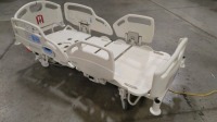 HILL-ROM CAREASSIST HOSPITAL BED W/SCALE,HEAD & FOOTBOARDS located at 902 nicholson road suite 200 Garland, TX 75042