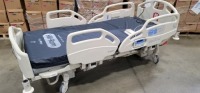 HILL-ROM CAREASSIST HOSPITAL BED W/SCALE,HEAD & FOOTBOARDS located at 902 nicholson road suite 200 Garland, TX 75042