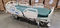 HILL-ROM CAREASSIST HOSPITAL BED W/SCALE,HEAD & FOOTBOARDS located at 902 nicholson road suite 200 Garland, TX 75042