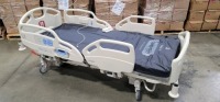 HILL-ROM CAREASSIST HOSPITAL BED W/SCALE,HEAD & FOOTBOARDS located at 902 nicholson road suite 200 Garland, TX 75042