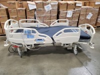 HILL-ROM CAREASSIST HOSPITAL BED W/SCALE,HEAD & FOOTBOARDS located at 902 nicholson road suite 200 Garland, TX 75042