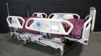 HILL-ROM TOTALCARE P1900 HOSPITAL BED W/SCALE & FOOTBOARD