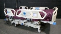 HILL-ROM TOTALCARE P1900 HOSPITAL BED W/SCALE & FOOTBOARD