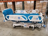 HILL-ROM TOTALCARE P1900 HOSPITAL BED W/SCALE,HEAD & FOOTBOARDS located at 902 nicholson road suite 200 Garland, TX 75042