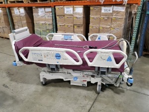 HILL-ROM TOTALCARE P1900 HOSPITAL BED W/SCALE,HEAD & FOOTBOARDS located at 902 nicholson road suite 200 Garland, TX 75042