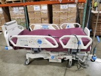 HILL-ROM TOTALCARE P1900 HOSPITAL BED W/SCALE,HEAD & FOOTBOARDS located at 902 nicholson road suite 200 Garland, TX 75042