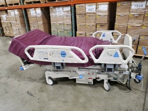 HILL-ROM TOTALCARE P1900 HOSPITAL BED W/SCALE,HEAD & FOOTBOARDS located at 902 nicholson road suite 200 Garland, TX 75042