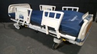 STRYKER SECURE 3002 HOSPITAL BED W/SCALE,HEAD & FOOTBOARDS