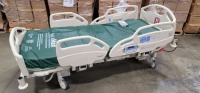 HILL-ROM CAREASSIST HOSPITAL BED W/SCALE,HEAD & FOOTBOARDS located at 902 nicholson road suite 200 Garland, TX 75042