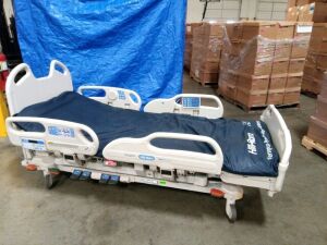 HILL-ROM VERSACARE HOSPITAL BED W/SCALE,HEAD & FOOTBOARDS located at 902 nicholson road suite 200 Garland, TX 75042
