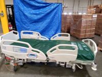 HILL-ROM CAREASSIST HOSPITAL BED W/SCALE,HEAD & FOOTBOARDS located at 902 nicholson road suite 200 Garland, TX 75042