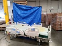 HILL-ROM CAREASSIST HOSPITAL BED W/SCALE,HEAD & FOOTBOARDS located at 902 nicholson road suite 200 Garland, TX 75042