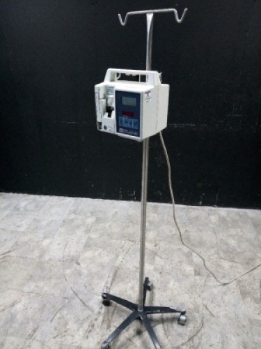 ABBOTT LIFECARE 5000 INFUSION PUMP ON ROLLING STAND