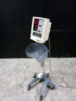 DATASCOPE ACCUTORR PLUS VITAL SIGN ON ROLLING STAND