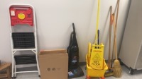 LOT OF CLEANING SUPPLIES TO INCLUDE: BROOMS, MOP, VACUUM CLEANER, LADDER AND FLOOR CLEANING BRUSHES