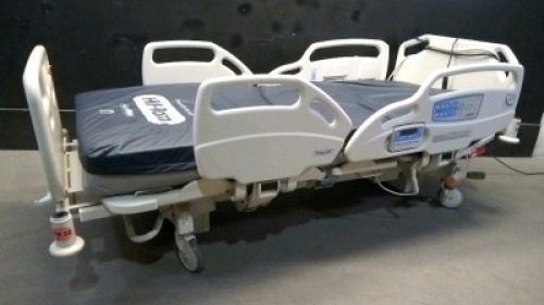 HILL-ROM CARE ASSIST ES HOSPITAL BED WITH HEAD AND FOOT BOARDS