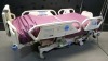 HILL-ROM P1900 TOTALCARE SPORT HOSPITAL BED WITH CPR AND FOOT BOARD AND 2 MODULES (PERC & VIB., ROTATION)