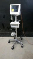 AGILENT M1204A V26C PATIENT MONITOR WITH MODULE RACK ON ROLLING STAND