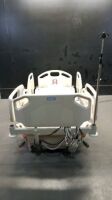 HILL-ROM CARE ASSIST ES HOSPITAL BED WITH HEAD AND FOOT BOARDS