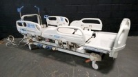 HILL-ROM VERSACARE HOSPITAL BED W/SCALE & FOOTBOARD