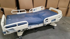 STRYKER SECURE 3002 HOSPITAL BED W/HEAD & FOOTBOARDS