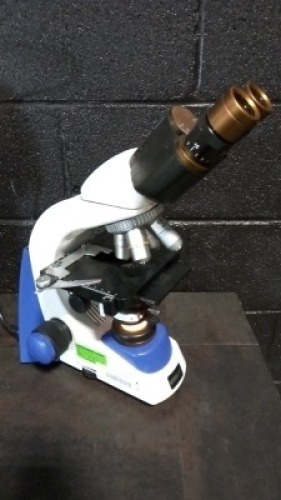 UNICO G380 LAB MICROSCOPE WITH OBJECTIVES (4/0.1,10/0.25,E A 40,100/1.25)