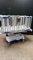 STRYKER CUB INFANT CRIB WITH SCALE