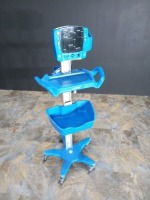 GE CARESCAPE V100 VITAL SIGN MONITOR ON ROLLING STAND