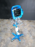 GE PROCARE VITAL SIGN MONITOR ON ROLLING STAND