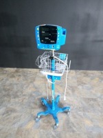 GE CARESCAPE V100 VITAL SIGN MONITOR ON ROLLING STAND