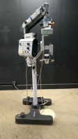 WILD HERRBRUGG M 691 SURGICAL MICROSCOPE TO INCLUDE SINGLE MOUNT BINOCULAR WITH EYEPIECES BOTH (10X/21) BOTTOM LENSE (F=250MM) & MULTI-FUNCTION FOOTSWITCH ON STAND