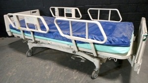 HILL-ROM ADVANCE 2000 HOSPITAL BED W/SCALE,HEAD & FOOTBOARDS