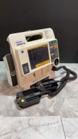 MEDTRONIC/PHYSIO-CONTROL LIFEPAK 12 BIPHASIC DEFIB WITH PACING, 3 LEAD ECG, ANALYZE, PADDLES, BATTERY