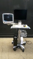 GE DASH 5000 PATIENT MONITOR ON COMPUTER CART