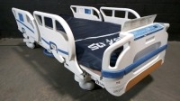 STRYKER 3005S3 HOSPITAL BED W/SCALE & FOOTBOARD