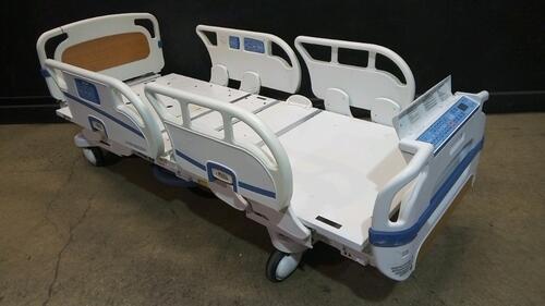 STRYKER SECURE 3002 S3 HOSPITAL BED WITH HEAD & FOOTBOARD (CHAPERONE WITH ZONE CONTROL, BED EXIT, SCALE) (IBED AWARENESS)