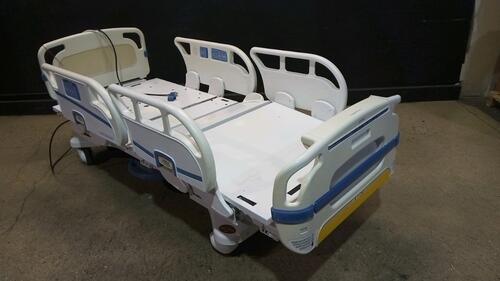 STRYKER SECURE 3002 S3 HOSPITAL BED WITH HEAD & FOOTBOARD (CHAPERONE WITH ZONE CONTROL, BED EXIT, SCALE) (IBED AWARENESS)