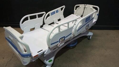 STRYKER SECURE 3002 S3 HOSPITAL BED WITH HEAD & FOOTBOARD (CHAPERONE WITH ZONE CONTROL, BED EXIT, SCALE) (IBED AWARENESS)