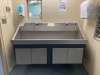 AMSCO DOUBLE BASIN, KNEE OPERATED SCRUB SINK (THIS LOT REQUIRES PROFESSIONAL DE-INSTALLATION AND CERTIFICATE OF INSURANCE)