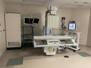 2003 SIEMENS AXIOM ICONOS R200 RF XRAY UNIT , FLOUROSPOT COMPACT, SYSTEM CONSOLE W CONTROL UNIT AND MONITOR, PATIENT TABLE, 2003 X-RAY TUBE W COLLIMATOR - OPTI 150, IN ROOM MONITOR CART, XRAY GENERATOR - POLYDOROS SX 80 (THIS LOT REQUIRES PROFESSIONAL DE-