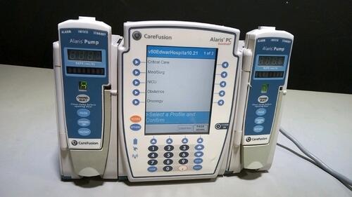 CAREFUSION ALARIS PC 8015 SERIES INFUSION PUMP WITH ALARIS PUMP 8100 SERIES MODULES