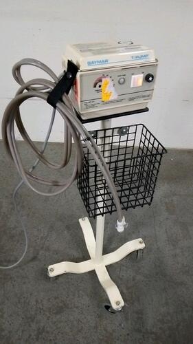 GAYMAR TP500C HEAT THERAPY PUMP ON ROLLING STAND