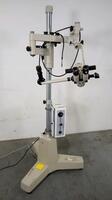 URBAN GLOBAL SURGICAL MICROSCOPE WITH SINGLE BINOCULAR (M1010A), VIEWING ATTACHMENT (M1010A), LIGHT SOURCE ON ROLLING STAND